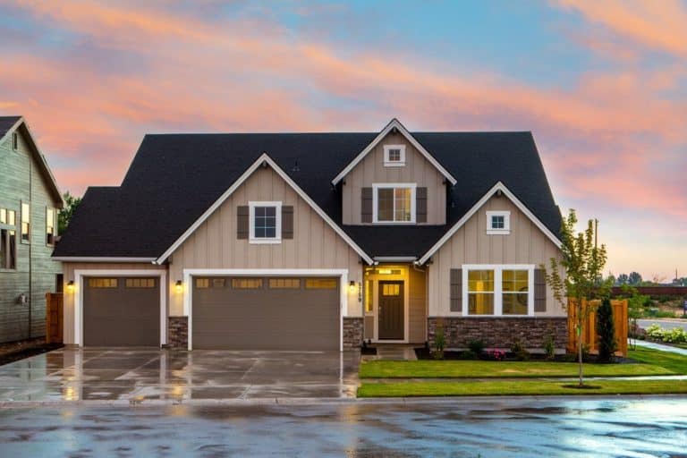 beautiful house with big garage door